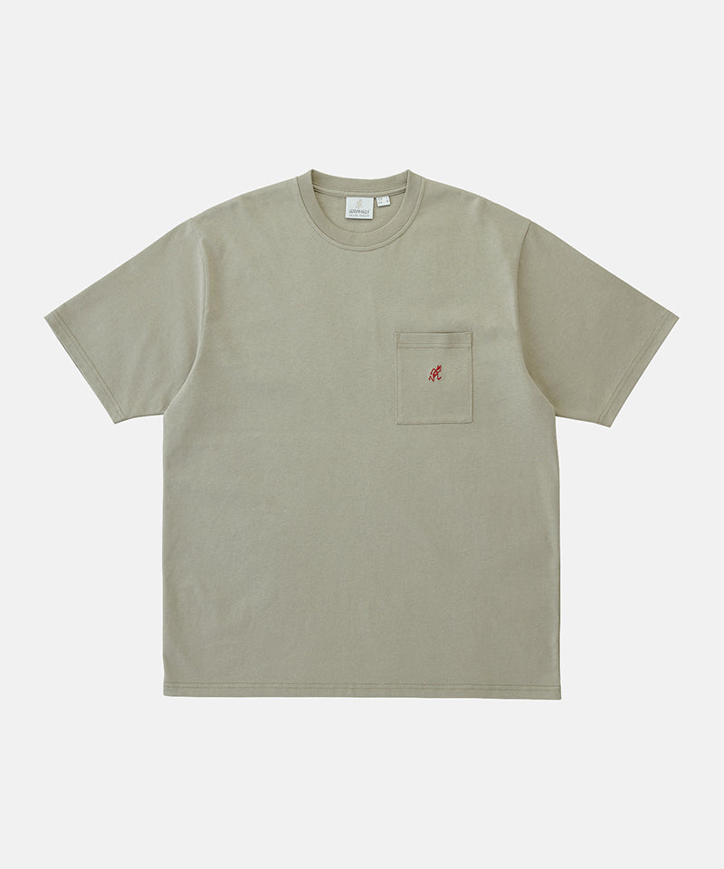 Gramicci beige One Point Tee with a small running man graphic against a light-tone background.