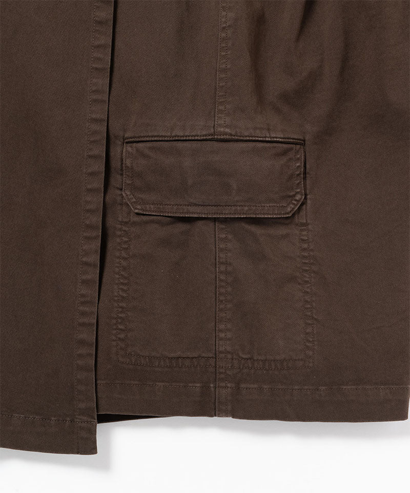 Close-up of a chocolate colored Gramicci G-Skort on a light-tone background.
