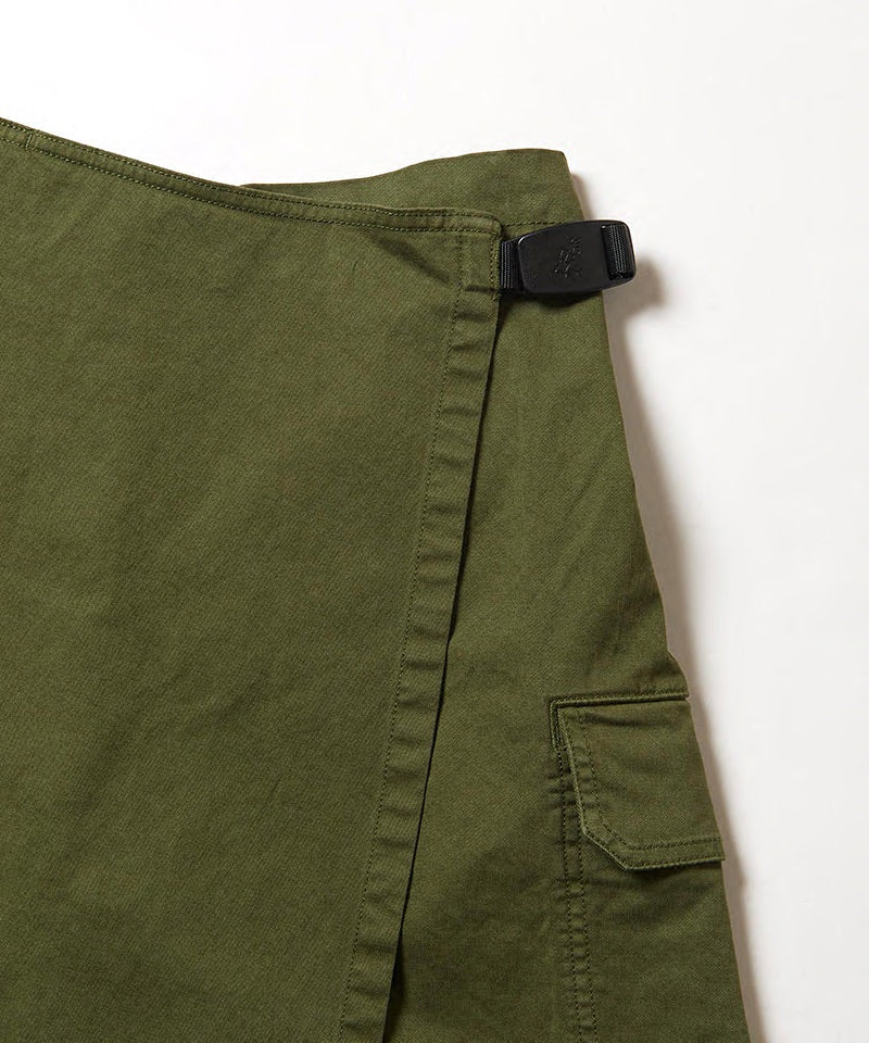Close-up of Gramicci G-Skort in the color olive against a light-tone background.