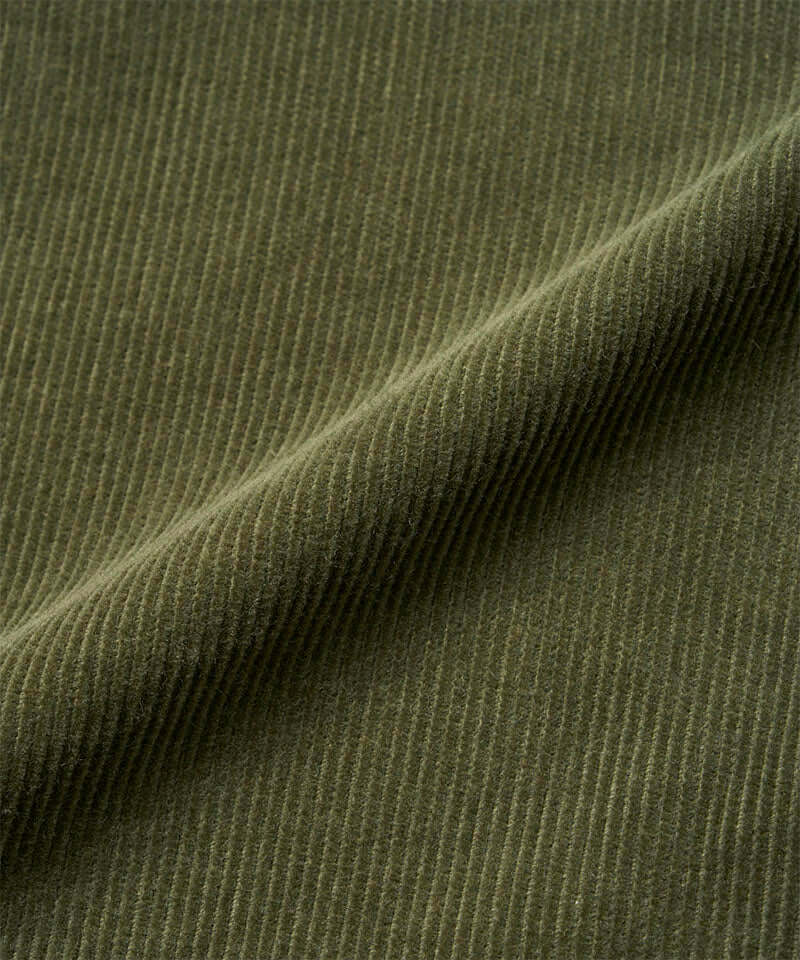 Toned olive colored colored Gramicci Corduroy Loose Tapered Ridge Pants fabric swatch.