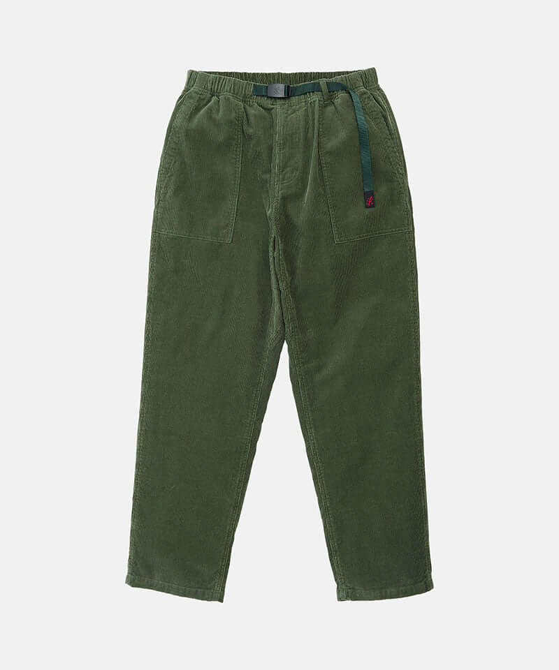 Toned olive colored Gramicci Corduroy Loose Tapered Ridge Pants with a belt against a light-tone background.