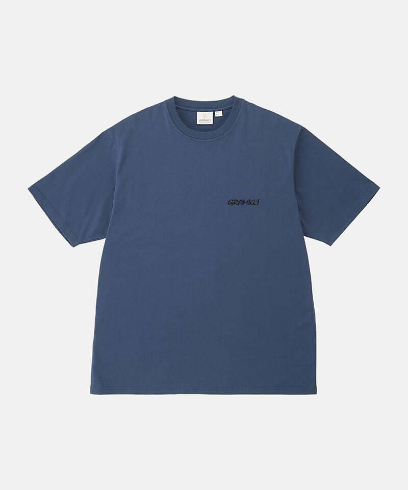 Gramicci navy Bass Tee against a light-tone background.