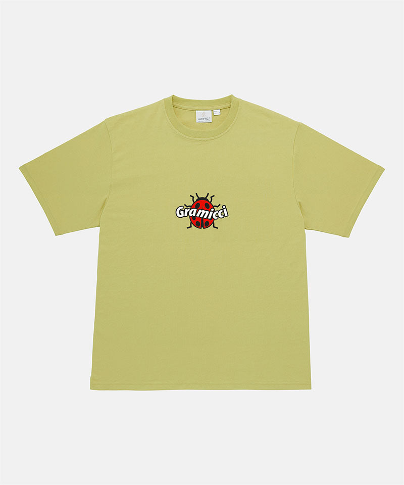 Gramicci sweet pea colored Ladybug Tee with colorful graphic against a light-tone background.