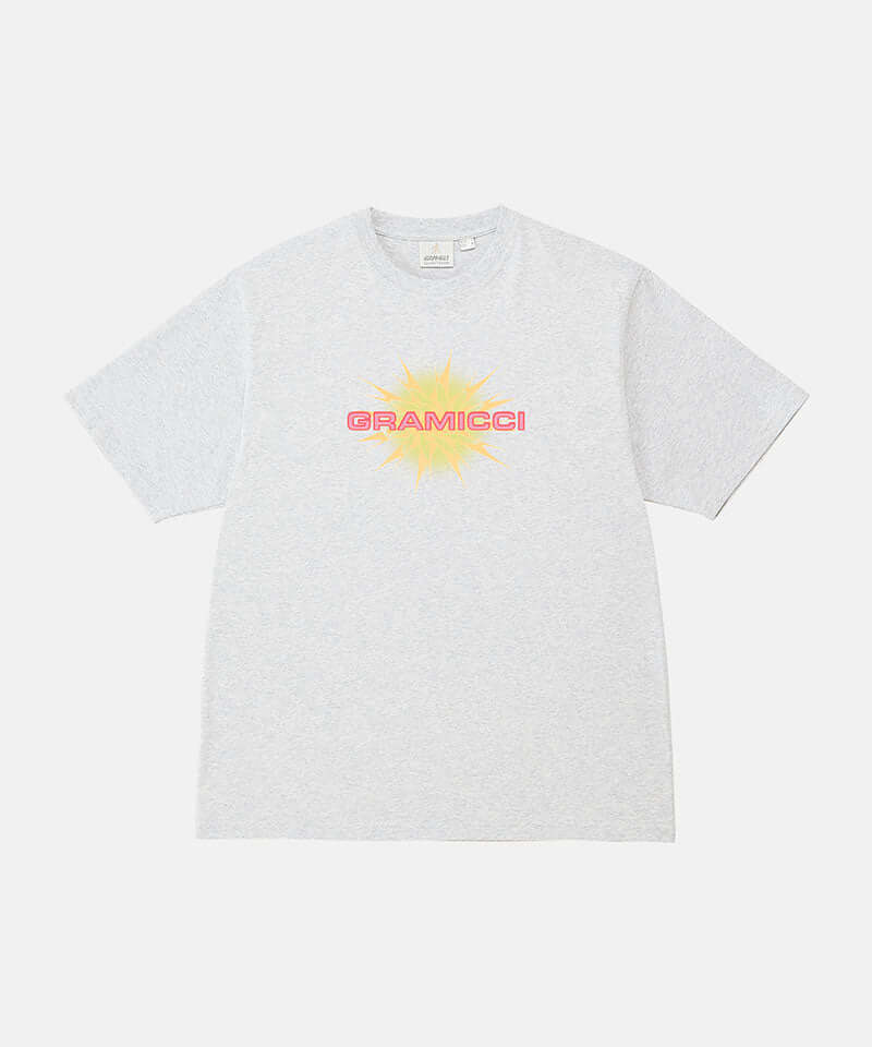 Gramicci ash heather colored Starburst Tee with a graphic against a light-tone background.