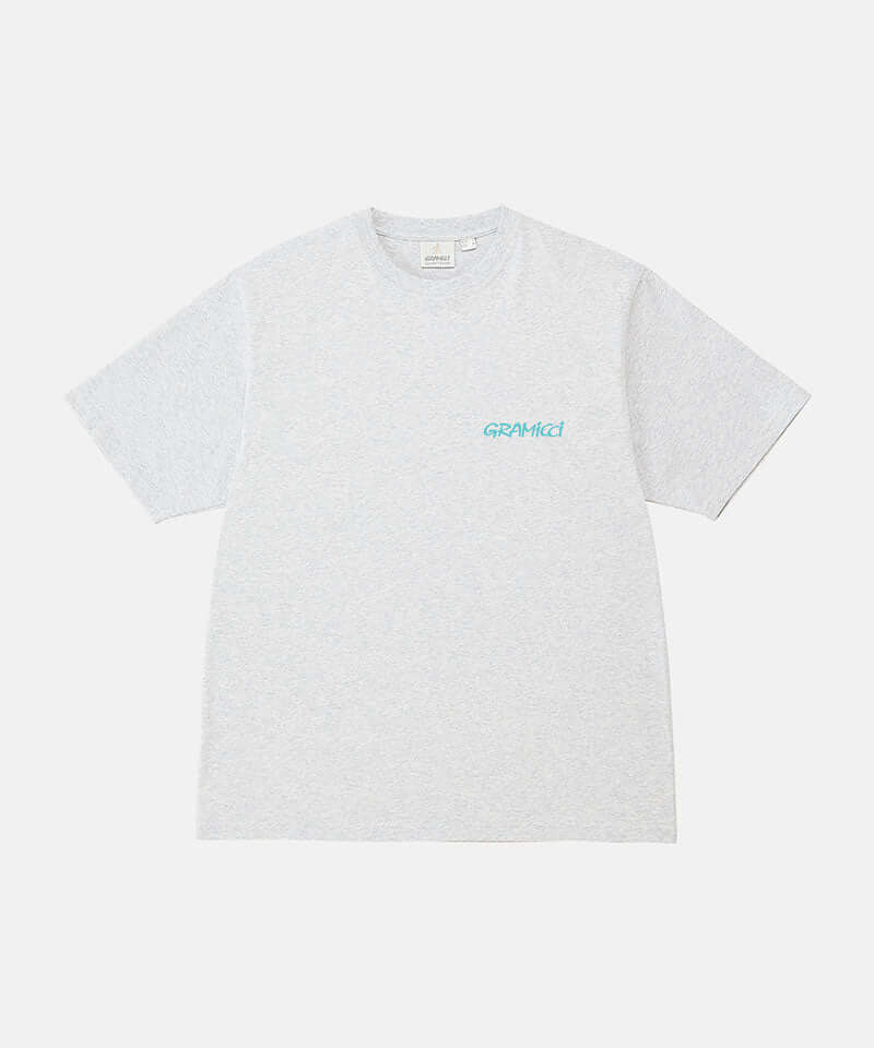 Gramicci ash heather color Joker Tee against a light-tone background.