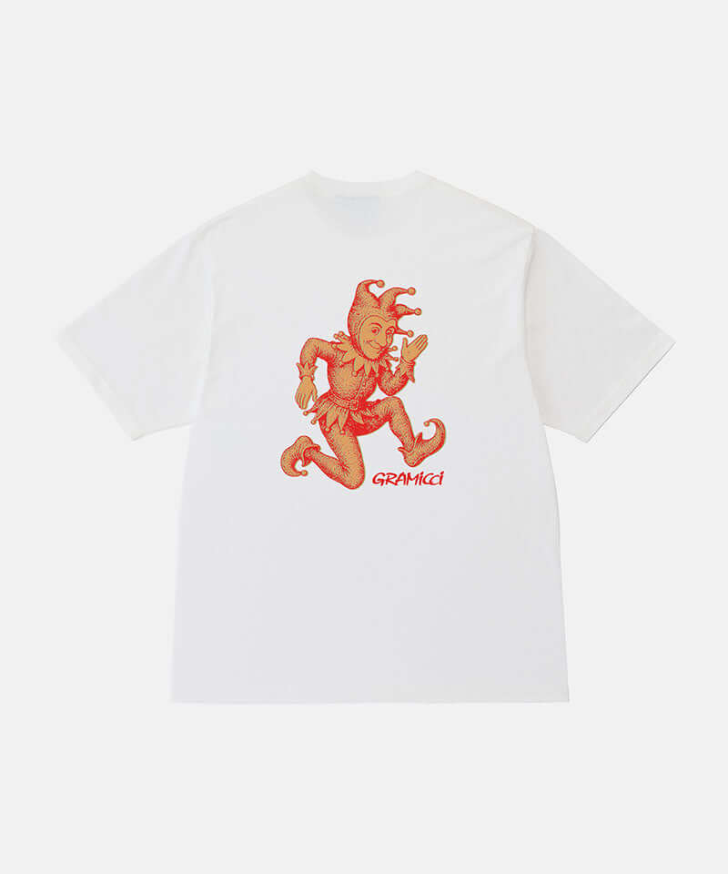 Back view of a Gramicci white Joker Tee with an orange graphic against a light-tone background.