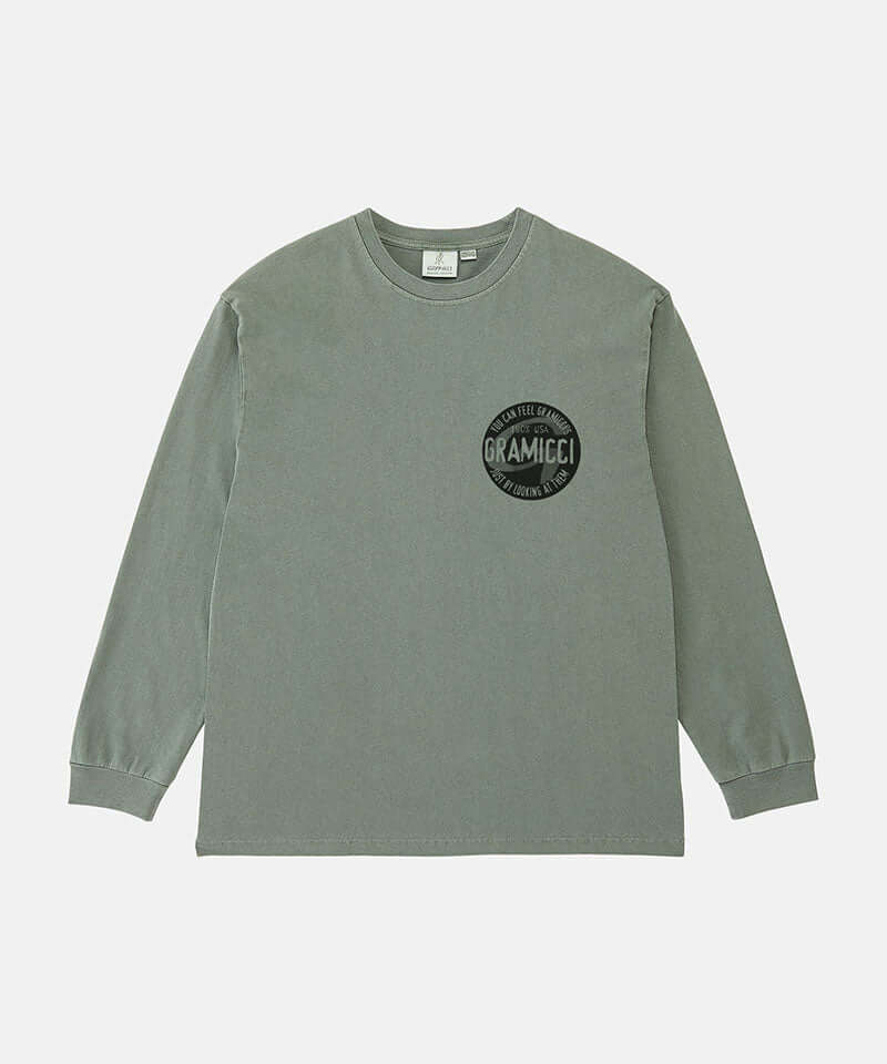 Gramicci sage pigment colored Icon Long Sleeve Tee Pigment Dyed with a graphic against a light-tone background.
