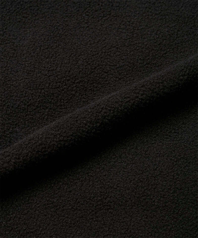Black Gramicci Thermal Fleece Skirt fabric swatch.