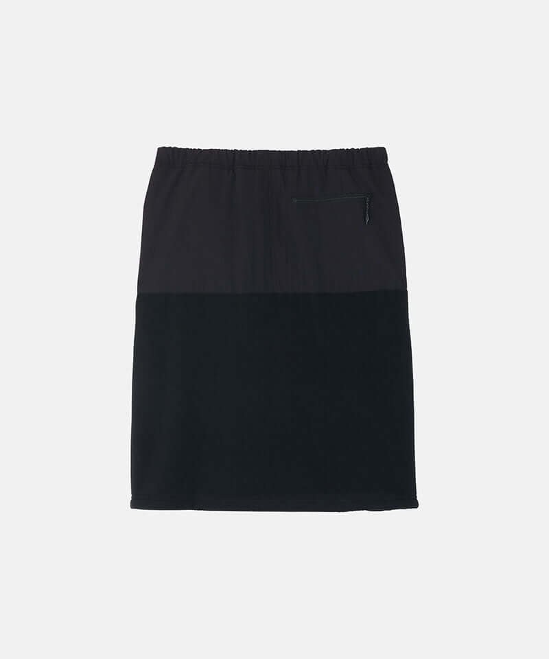 Back view of a black Gramicci Thermal Fleece Skirt against a light-tone background.