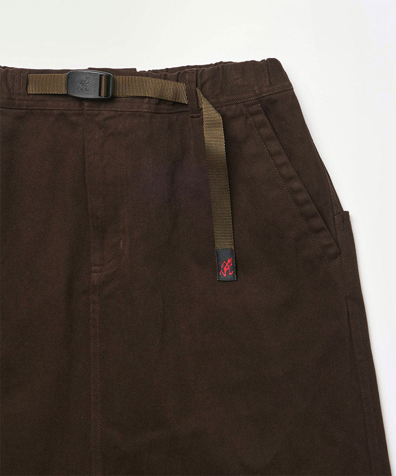 Close-up view of a coffee colored Gramicci Venture Skirt against a light-tone background.