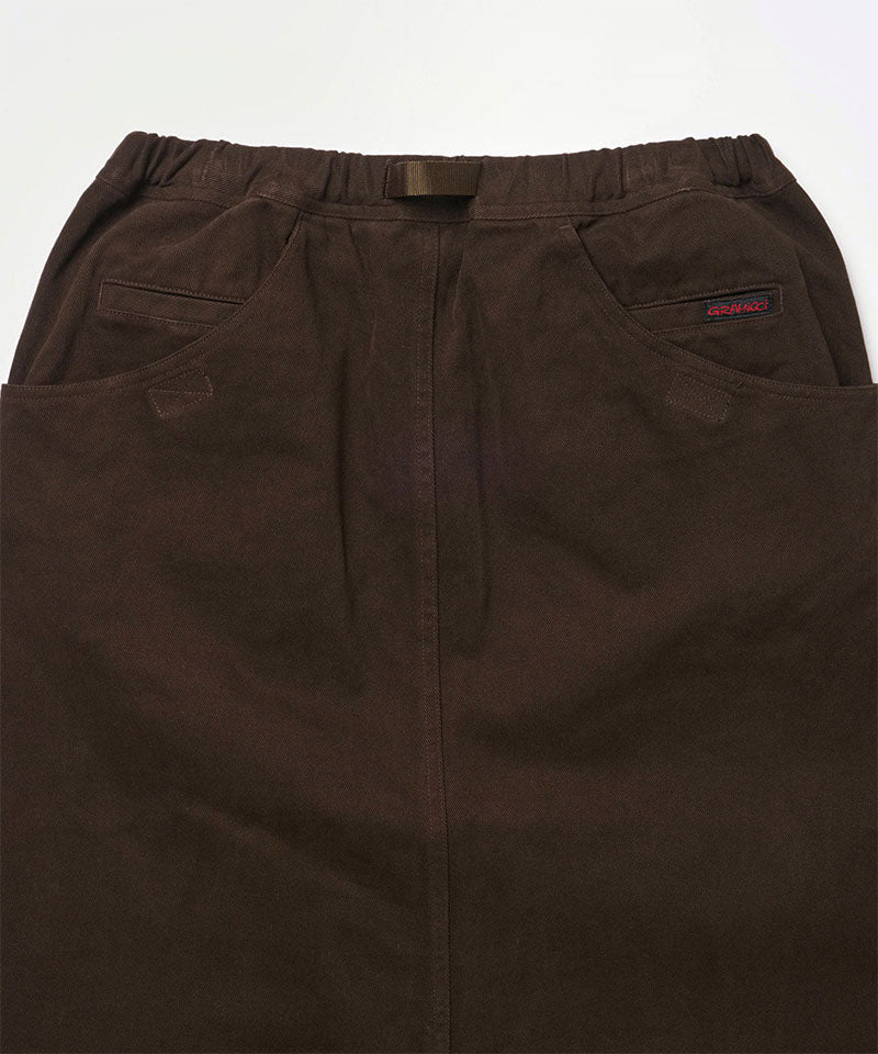 Back view close-up of a coffee colored Gramicci Venture Skirt against a light-tone background.