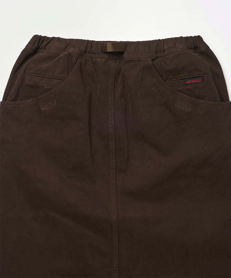 Back view close-up of a coffee colored Gramicci Venture Skirt against a light-tone background.