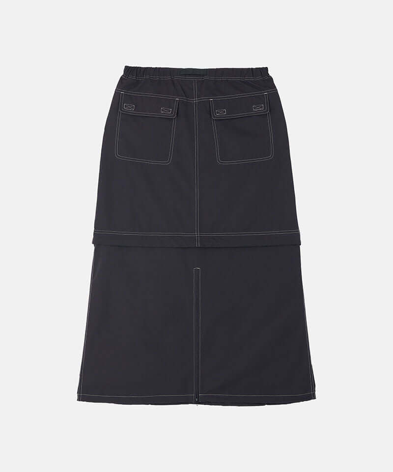Back view of a black women's Gramicci WR Convertible Skirt against a light-tone background.