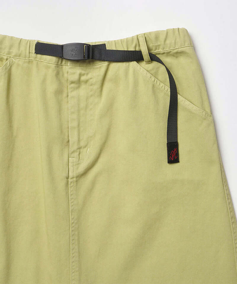 Close-up view of a elm pigment colored Gramicci 5-Pocket Skirt against a light-tone background.