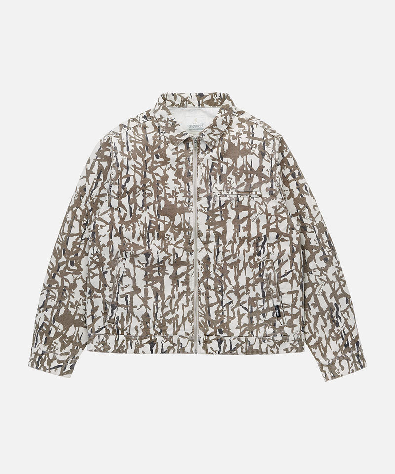 Gramicci grey reed camouflage Taos Canvas Jacket against a light-tone background.
