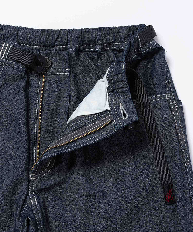 Close-up of Japanese Chambray Rock Slide Pants in the color navy against a light-tone background.