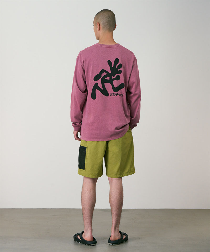 Person wearing a red long-sleeve shirt with a black graphic on the back, standing against a plain background.