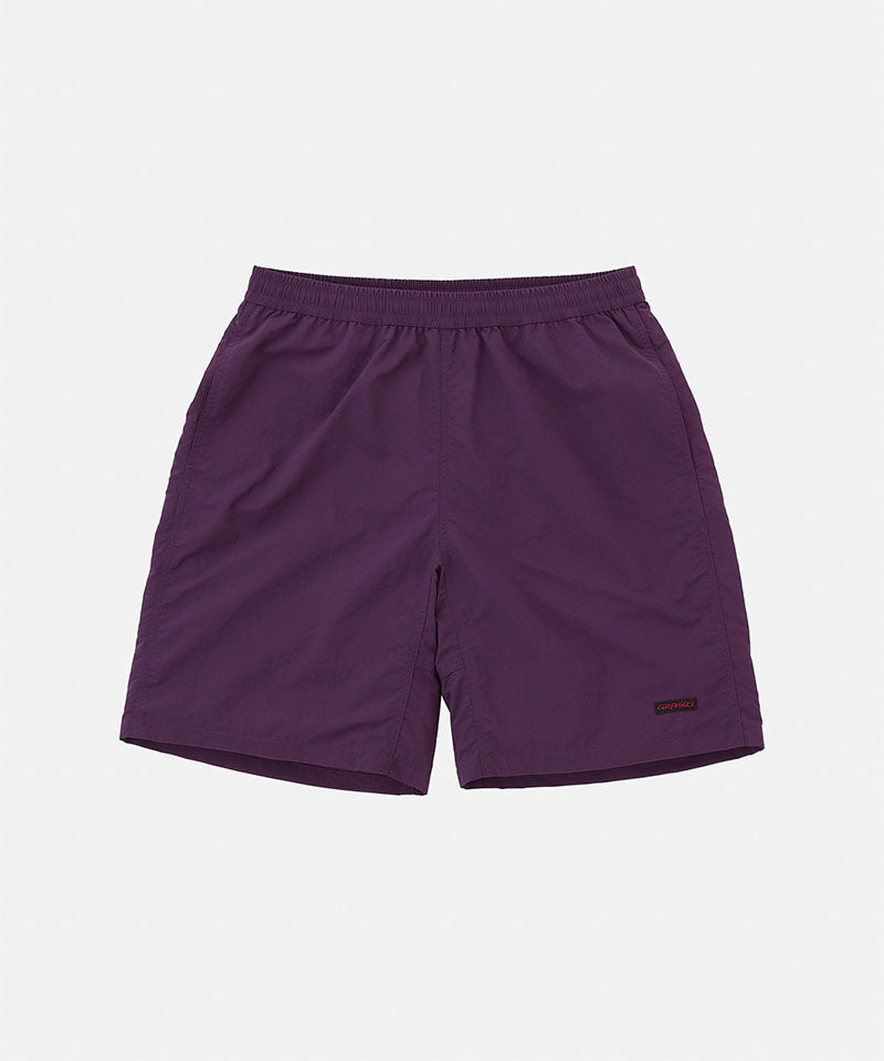 Purple shorts on a light purple background