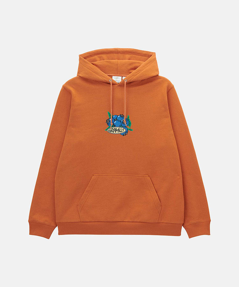 Gramicci Blueberry Hooded Sweatshirt with blueberry graphic in orange against a light tone background.