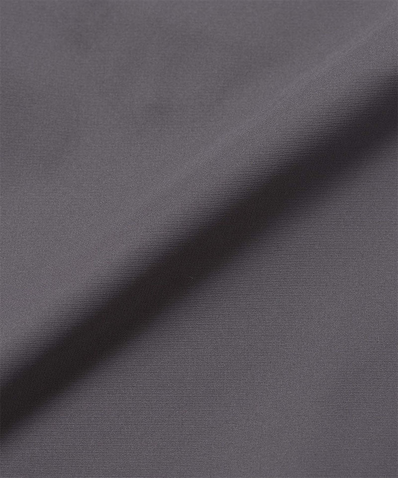 Gramicci dark gray fabric texture with a subtle pattern