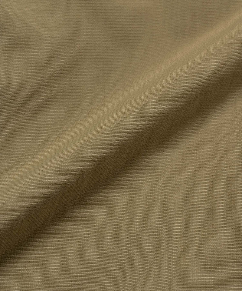 Gramicci khaki colored Gramicci Convertible Cargo Skirt fabric swatch.