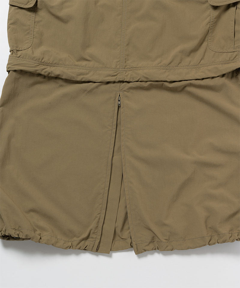 Close-up of Gramicci Convertible Cargo Skirt in the color khaki against a light-tone background.