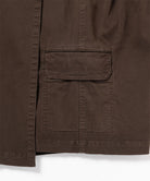 Close-up of a chocolate colored Gramicci G-Skort on a light-tone background.