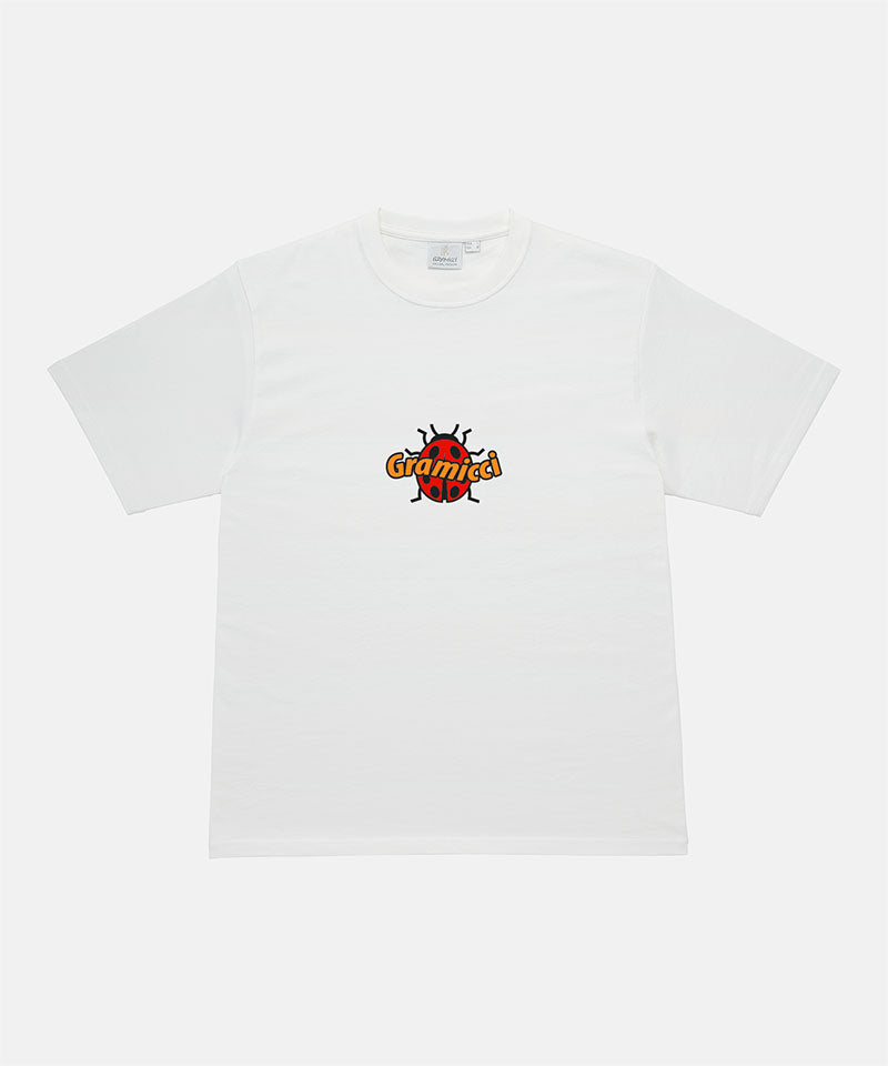 Gramicci white Ladybug Tee with colorful graphic against a light-tone background.