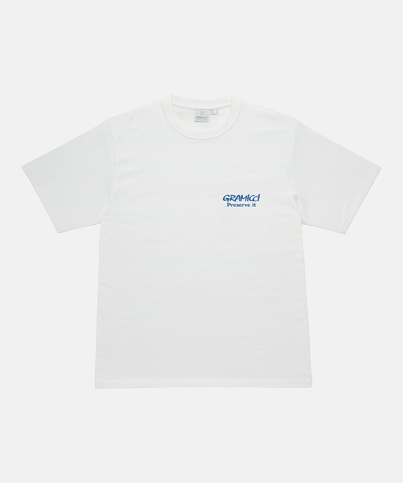 Gramicci sage pigment colored Earth Tee with blue graphic against a light-tone background.