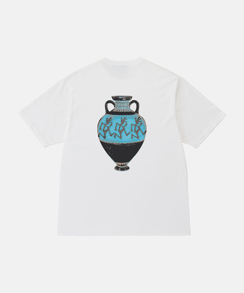 Back view of a Gramicci white Vase Tee with a graphic against a light-tone background.