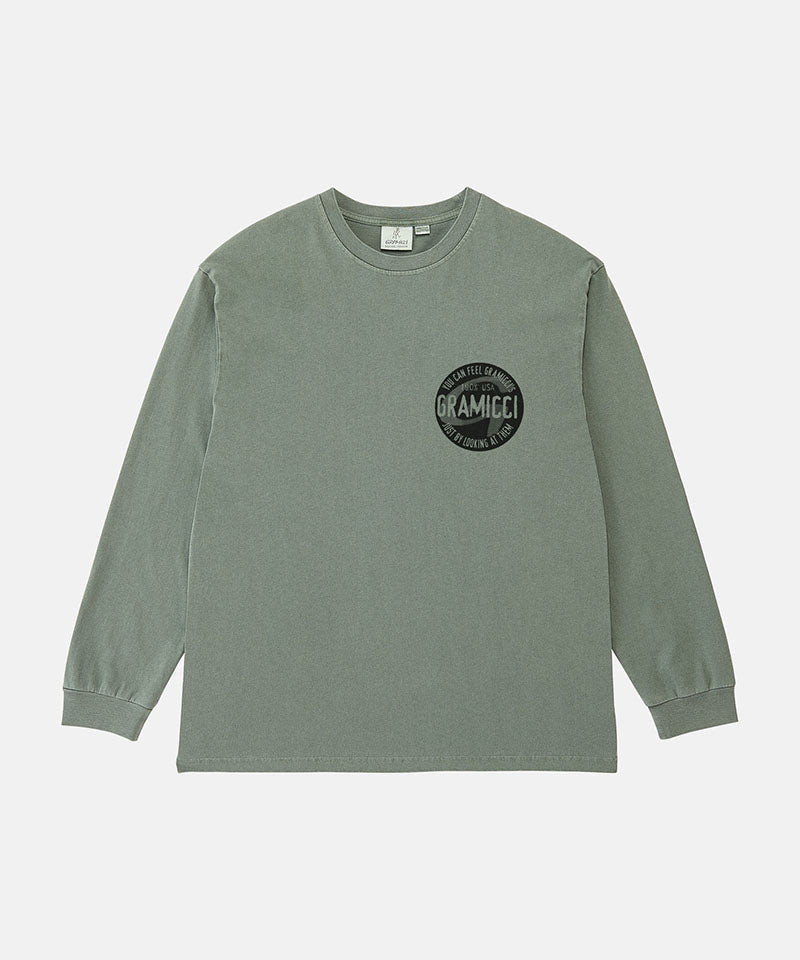 Gramicci sage pigment colored Icon Long Sleeve Tee Pigment Dyed with a graphic against a light-tone background.