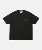 Gramicci black One Point Logo Tee with a graphic against a light-tone background.