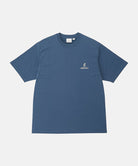 Gramicci dusky blue One Point Logo Tee with a graphic against a light-tone background.