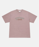 Gramicci lillac pigment colored Livin' Tee Pigment Dyed with a Livin' Under A Rock graphic against a light-tone background.