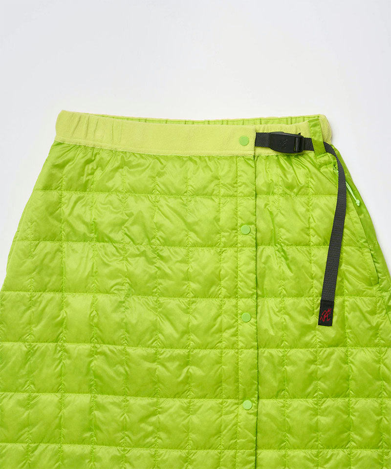 Close-up view of a lime colored Gramicci G-Zero Primaloft Skirt against a light-tone background.