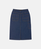 Back view of a rinsed indigo Gramicci Denim Carpenter Skirt against a light-tone background.