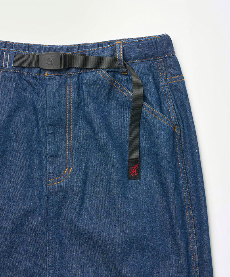 Close-up view of a stone colored Gramicci Denim Carpenter Skirt against a light-tone background.