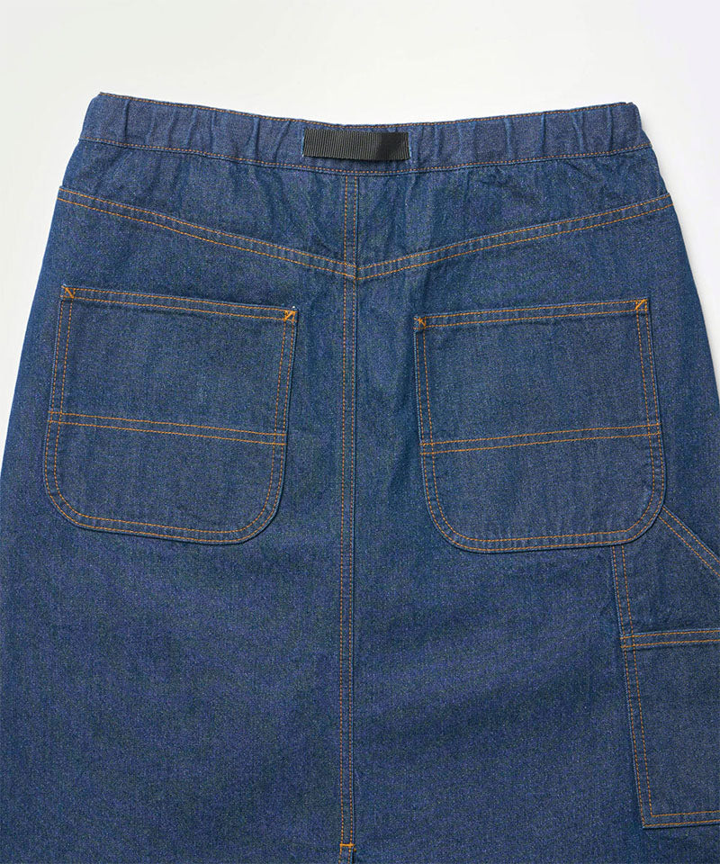 Back view close-up of a stone colored Gramicci Denim Carpenter Skirt against a light-tone background.