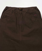 Back view close-up of a coffee colored Gramicci Venture Skirt against a light-tone background.