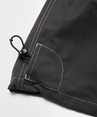Black women's Gramicci WR Convertible Skirt hem showing a drawstring on a light-tone background.