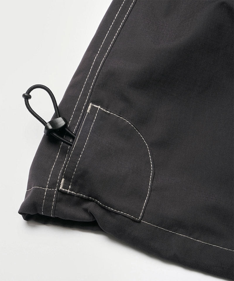 Black women's Gramicci WR Convertible Skirt hem showing a drawstring on a light-tone background.
