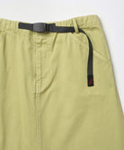Close-up view of a elm pigment colored Gramicci 5-Pocket Skirt against a light-tone background.