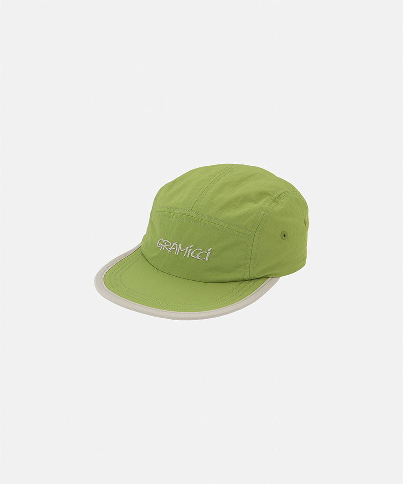 Jade green colored Nylon Gramicci Cap with a gray brim and logo on a light tone background.