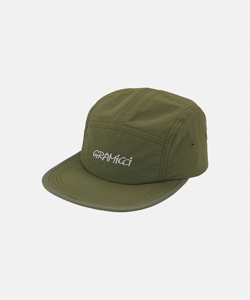 Olive green Nylon Gramicci Cap
with 'Gramicci' logo on a  light tone background.