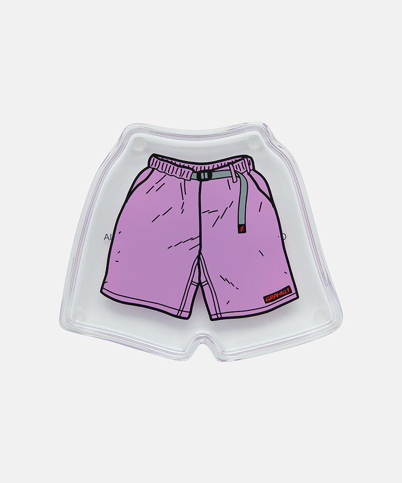 Small clear molded tray with purple shorts design on a white background