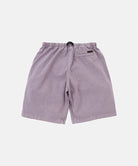 Back view of the Gramicci Natural Dyed Jam Short in purple with a black belt against a light-tone background.
