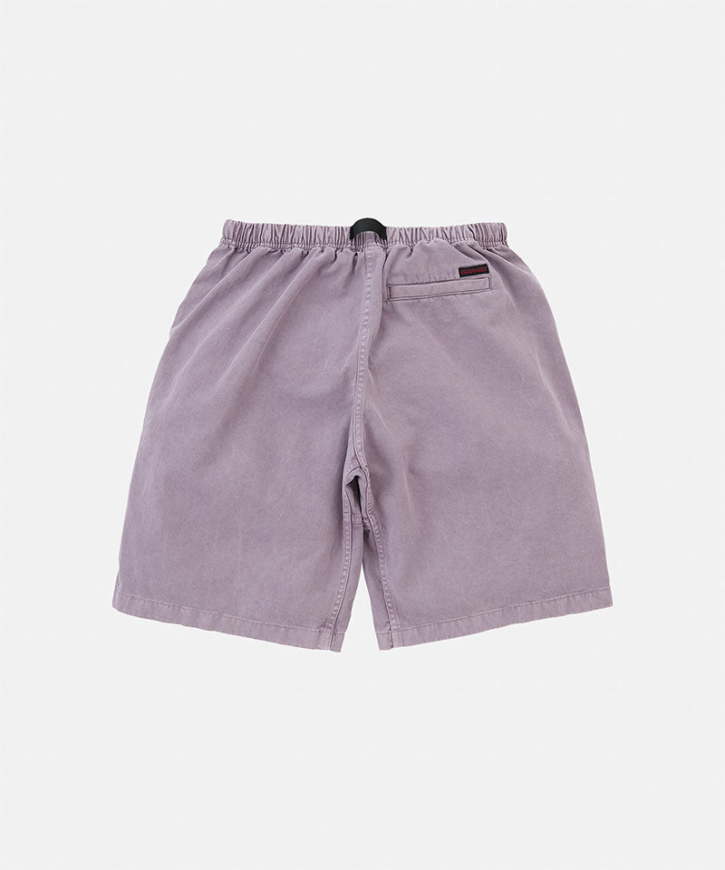 Back view of the Gramicci Natural Dyed Jam Short in purple with a black belt against a light-tone background.
