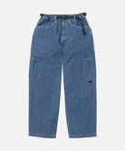 Japanese Chambray Rock Slide Pant in blue with a black belt against a light-tone background.