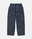 Japanese Chambray Rock Slide Pant in navy with a black belt against a light-tone background.