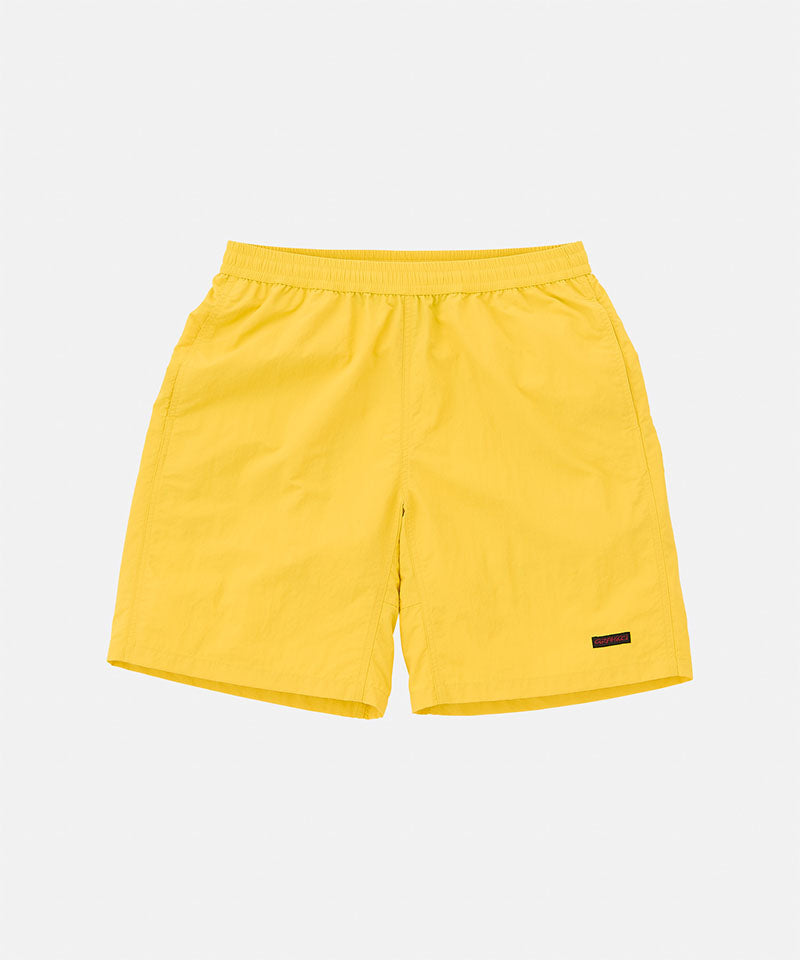 Yellow shorts on a light gray background